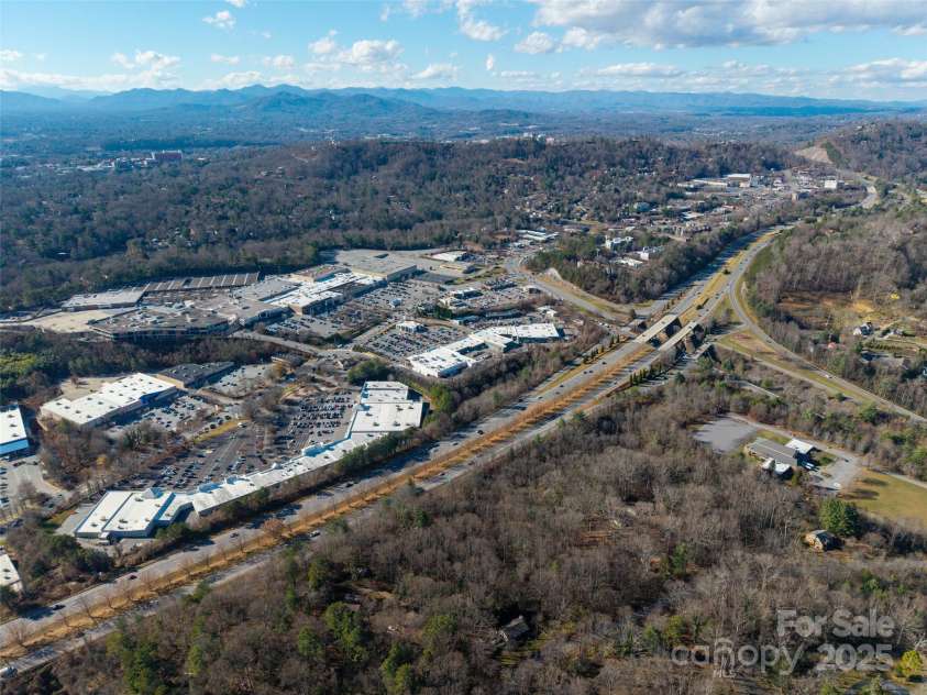67 Shawnee Trail, Asheville, NC 28805.  MLS# CAR4331437, YatesRealty ID 1563. Across I 240 and adjacent to Tunnel Road