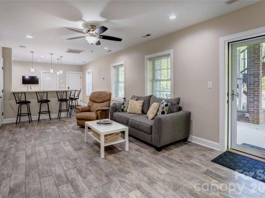 1390 Bennington Drive, Concord, NC 28027.  MLS# CAR4371953, YatesRealty ID 15633. Basement - living room