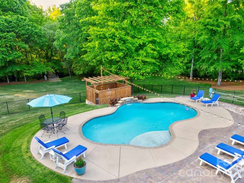1390 Bennington Drive, Concord, NC 28027.  MLS# CAR4371953, YatesRealty ID 15633. Designed for long, sunny days