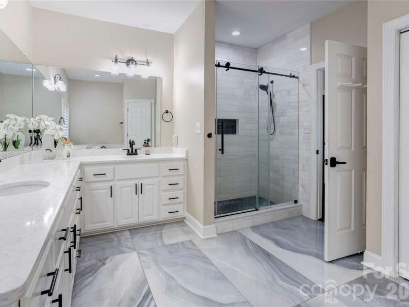 1390 Bennington Drive, Concord, NC 28027.  MLS# CAR4371953, YatesRealty ID 15633. Start and end your day in luxury