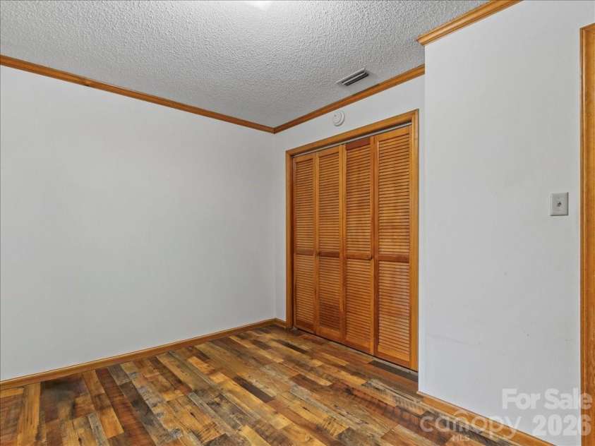 190 Executive Estates Drive, Old Fort, NC 28762.  MLS# CAR4349783, YatesRealty ID 15634. Bedroom 1 