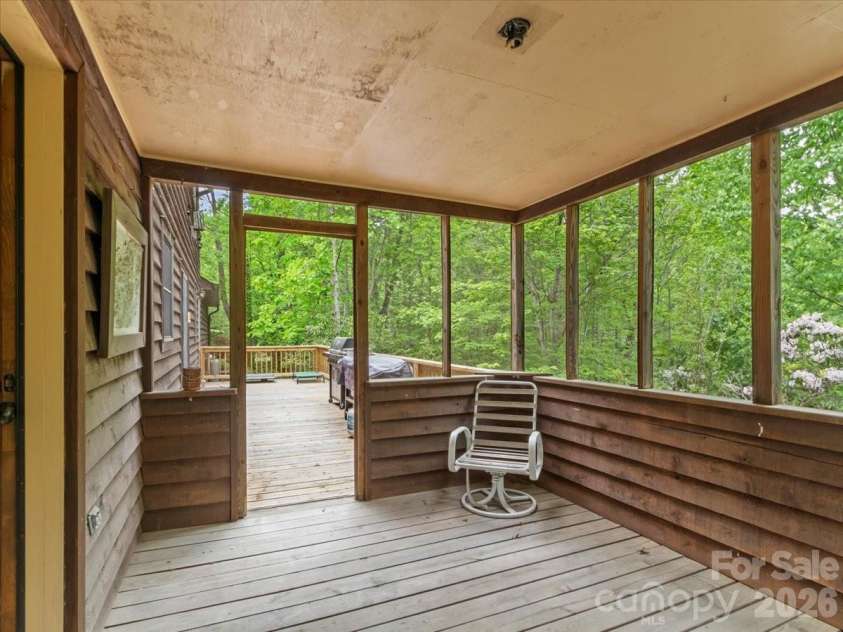 190 Executive Estates Drive, Old Fort, NC 28762.  MLS# CAR4349783, YatesRealty ID 15634. Screened porch