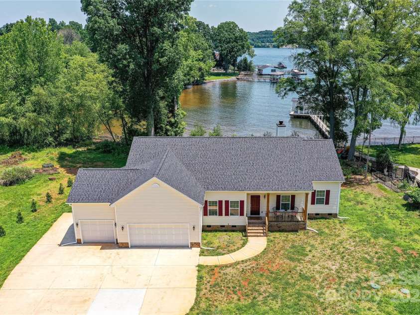 4980 Kiser Island Road, Terrell, NC 28682.  MLS# CAR4241142, YatesRealty ID 1564. Aerial View of Waterfront, Custom Designed Home with 3 Bedroom, 2.5 Bath, Ranch & 3 Car Garage, with views of Lake from front & back of home, located on Kiser Island with NO HOA!