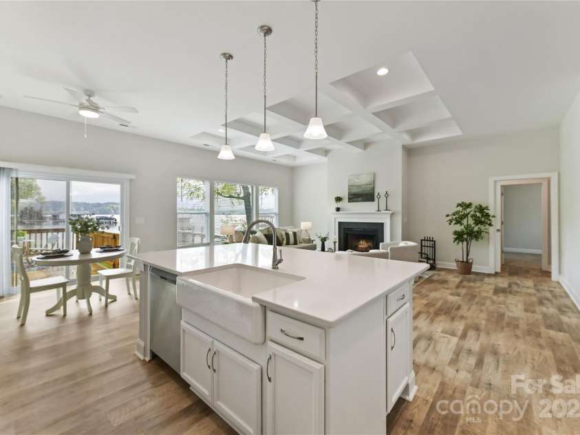 4980 Kiser Island Road, Terrell, NC 28682.  MLS# CAR4241142, YatesRealty ID 1564. Kitchen features quartz counters, island with seating/storage, stainless steel appliances, tile back splash, upgraded lighting & breakfast area!