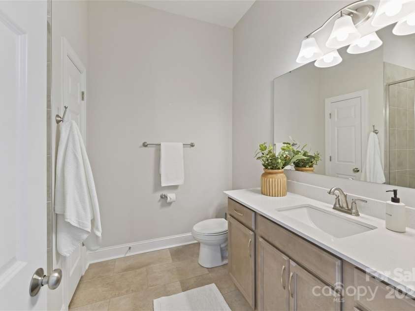 4980 Kiser Island Road, Terrell, NC 28682.  MLS# CAR4241142, YatesRealty ID 1564. Primary Bath with tiled shower with bench!