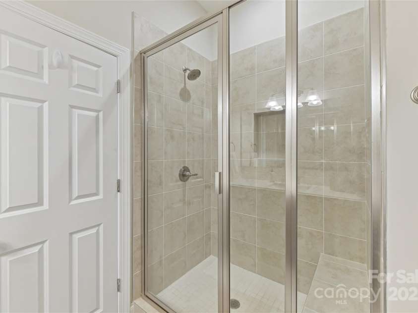 4980 Kiser Island Road, Terrell, NC 28682.  MLS# CAR4241142, YatesRealty ID 1564. Primary Bath with tiled shower with bench!