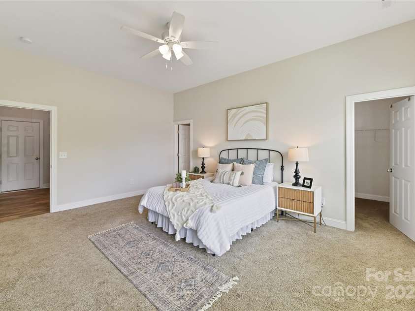 4980 Kiser Island Road, Terrell, NC 28682.  MLS# CAR4241142, YatesRealty ID 1564. Primary Suite with ceiling fan/light, private bath, walk in closet & large windows for prefect lake views!