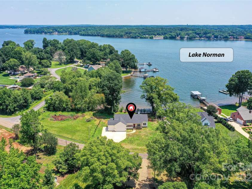 4980 Kiser Island Road, Terrell, NC 28682.  MLS# CAR4241142, YatesRealty ID 1564. Waterfront, Custom Designed Home with 3 Bedroom, 2.5 Bath, Ranch & 3 Car Garage, with views of Lake from front & back of home, located on Kiser Island with NO HOA!