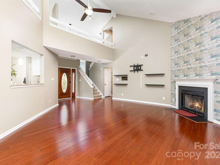 7218 Jacobs Fork Lane, Charlotte, NC 28273.  MLS# CAR4254104, YatesRealty ID 15642. Virtually enhanced fireplace