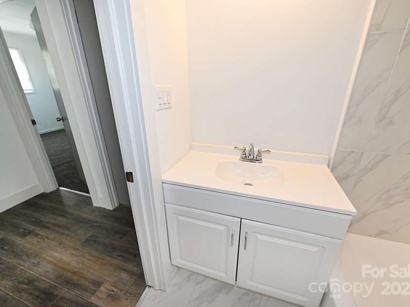 125 Ervin Avenue, Newton, NC 28658.  MLS# CAR4192439, YatesRealty ID 15645. 