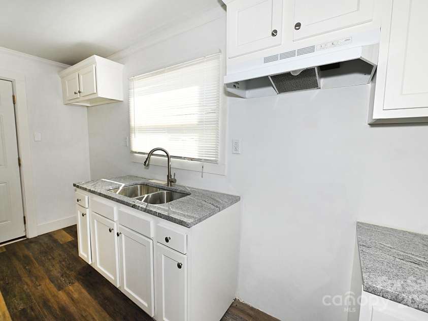 125 Ervin Avenue, Newton, NC 28658.  MLS# CAR4192439, YatesRealty ID 15645. 