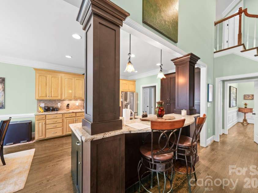 5540 Dogwood Boulevard, Kannapolis, NC 28081.  MLS# CAR4363930, YatesRealty ID 15649. View into the Kitchen with bartop.