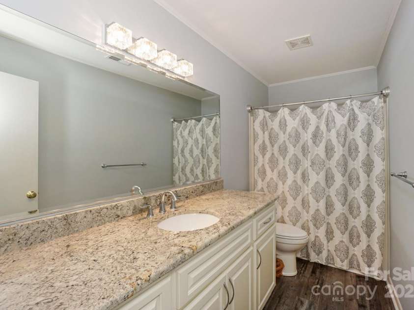 22025 Torrence Chapel Road, Cornelius, NC 28031.  MLS# CAR4244021, YatesRealty ID 15652. Full Bath w/ Marble countertop in Hallway and Second Bedroom