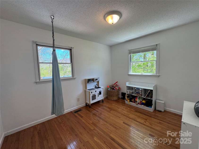 506 Greenbriar Drive, West Jefferson, NC 28694.  MLS# CAR4253689, YatesRealty ID 15655. 2nd bedroom being used as a play room