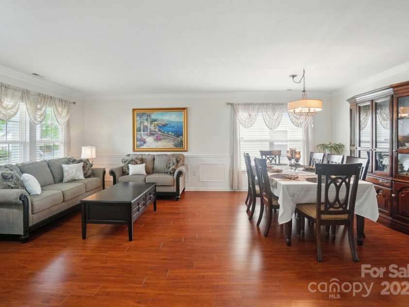 512 Nanny Point Drive, Monroe, NC 28110.  MLS# CAR4260981, YatesRealty ID 15657. Open layout-Living room & dinning area