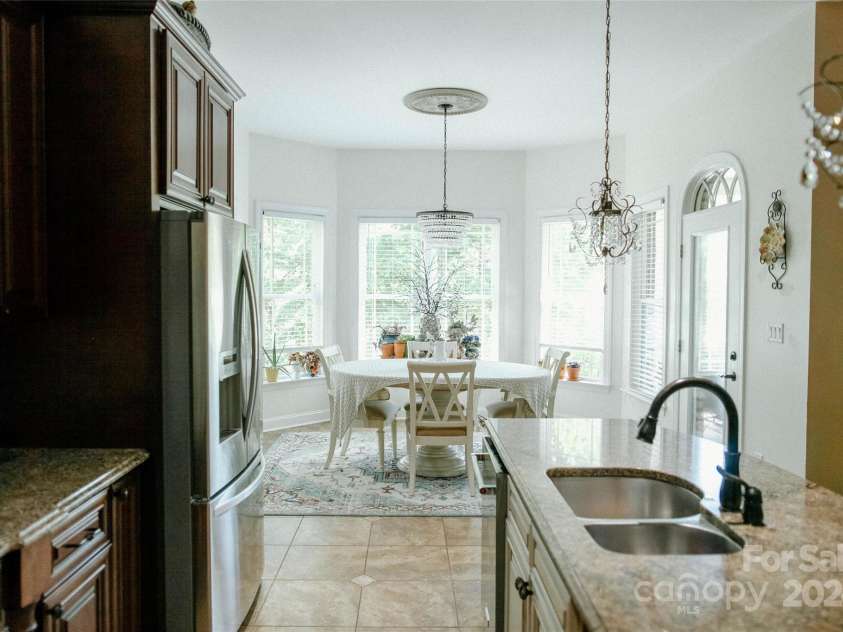 4642 King Crowder Drive, Gastonia, NC 28052.  MLS# CAR4147869, YatesRealty ID 1566. View in kitchen to dining area