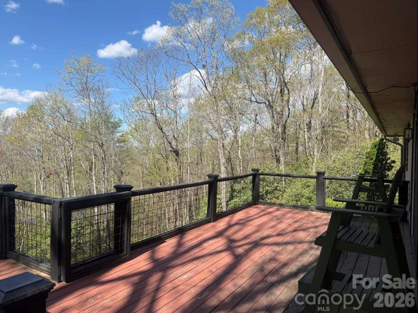 78 Highland Drive, Lake Toxaway, NC 28747.  MLS# CAR4370339, YatesRealty ID 15661. Back deck