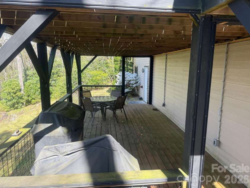 78 Highland Drive, Lake Toxaway, NC 28747.  MLS# CAR4370339, YatesRealty ID 15661. Underneath the upper deck