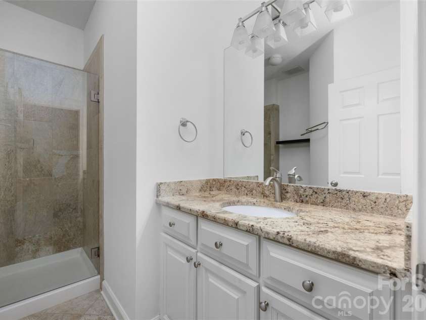 18840 Nautical Drive, Cornelius, NC 28031.  MLS# CAR4402035, YatesRealty ID 15666. Guest Bathroom