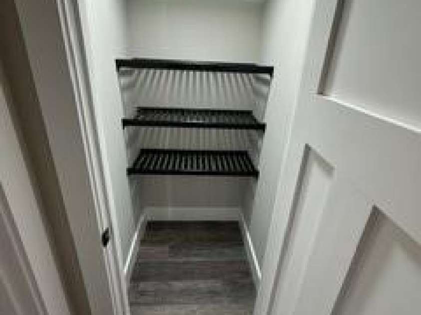 308 Ninth Street, Black Mountain, NC 28711.  MLS# CAR4210597, YatesRealty ID 1567. Linen closet upstairs