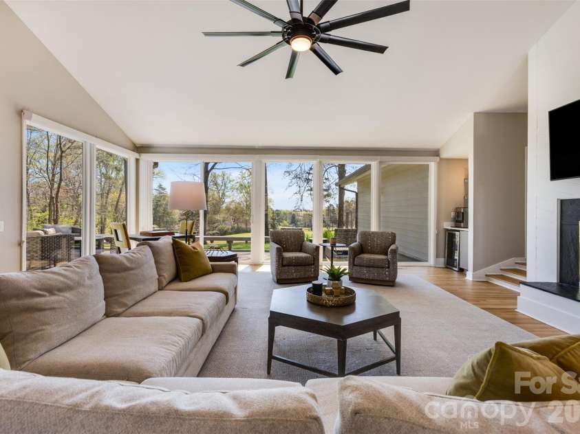 6 Pine Knoll Drive, Lake Wylie, SC 29710.  MLS# CAR4360481, YatesRealty ID 15676. Floor to ceiling windows and doors.