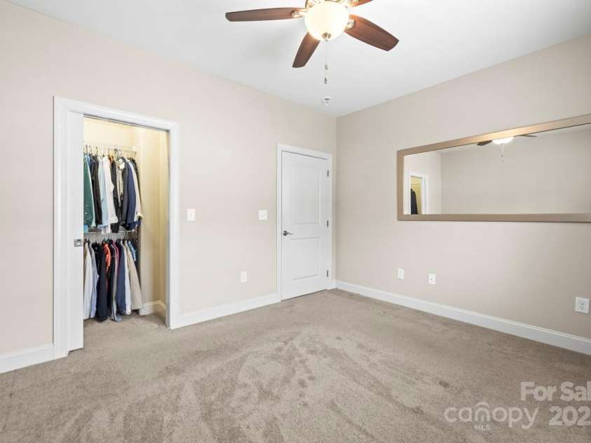 2008 Surefire Court, Denver, NC 28037.  MLS# CAR4220596, YatesRealty ID 15679. BR 2 features a ceiling fan and rarely used carpeting