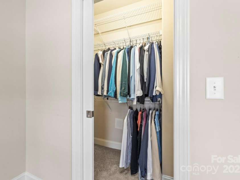 2008 Surefire Court, Denver, NC 28037.  MLS# CAR4220596, YatesRealty ID 15679. The pocket door minimizes space while providing more storage in the closet of BR 2
