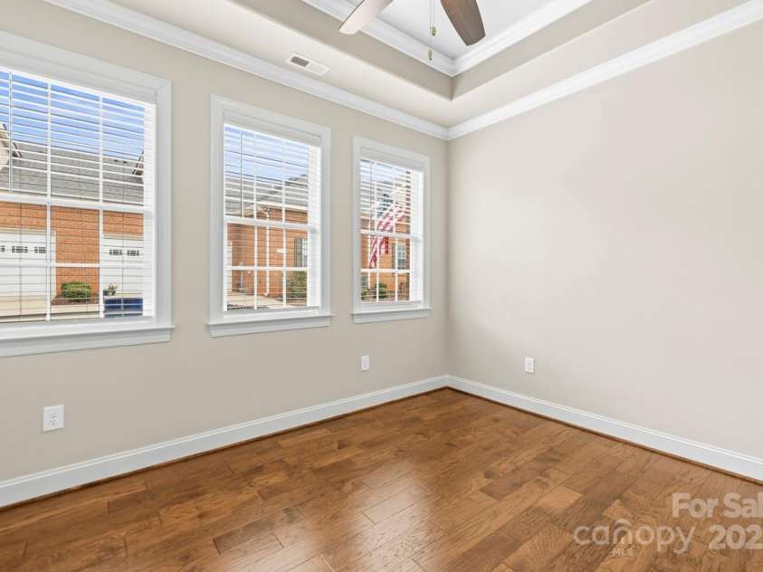 2008 Surefire Court, Denver, NC 28037.  MLS# CAR4220596, YatesRealty ID 15679. The wall of windows stream in the soothing sunlight