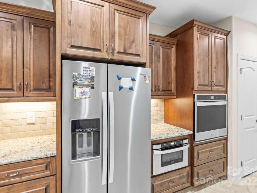 2008 Surefire Court, Denver, NC 28037.  MLS# CAR4220596, YatesRealty ID 15679. The wall oven and built in microwave make cooking here a delight