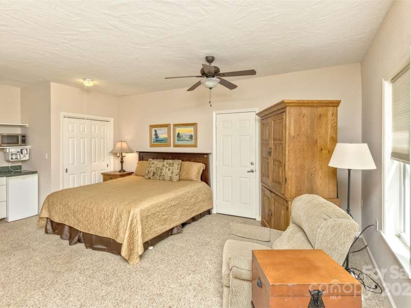 15 Beaverdam Knoll Road, Asheville, NC 28804.  MLS# CAR4283730, YatesRealty ID 1568. A private bathroom, kitchenette, sitting area and double closet make the apartment a sweet suite!