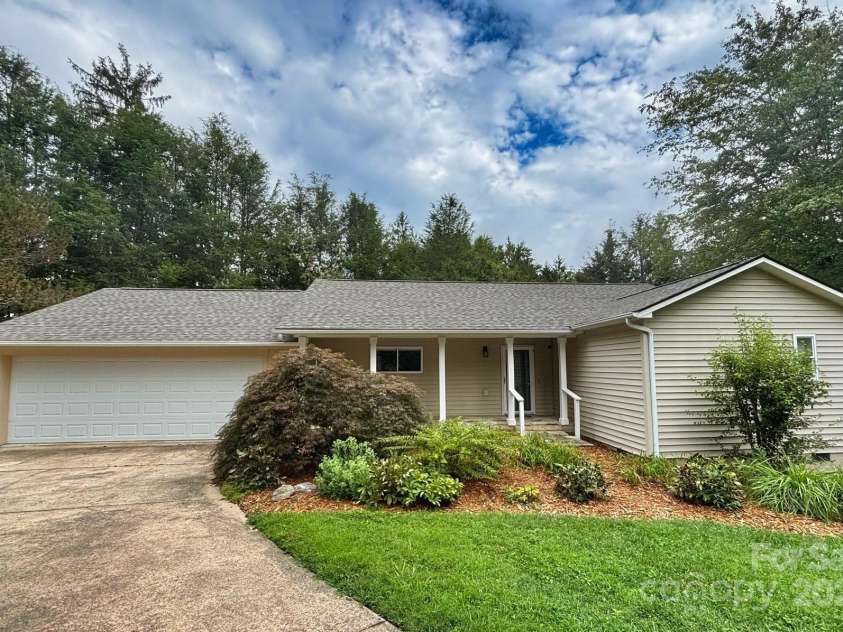 15 Beaverdam Knoll Road, Asheville, NC 28804.  MLS# CAR4283730, YatesRealty ID 1568. Beautiful landscaping accents the home and provides a haven for an abundance of wildlife. The architectural shingle roof was completed in July 2025.