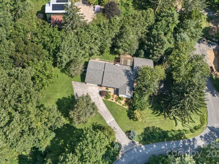 15 Beaverdam Knoll Road, Asheville, NC 28804.  MLS# CAR4283730, YatesRealty ID 1568. Located just off Beaverdam Road, the home is situated on over an acre with a concrete upper driveway and asphalt lower driveway.
