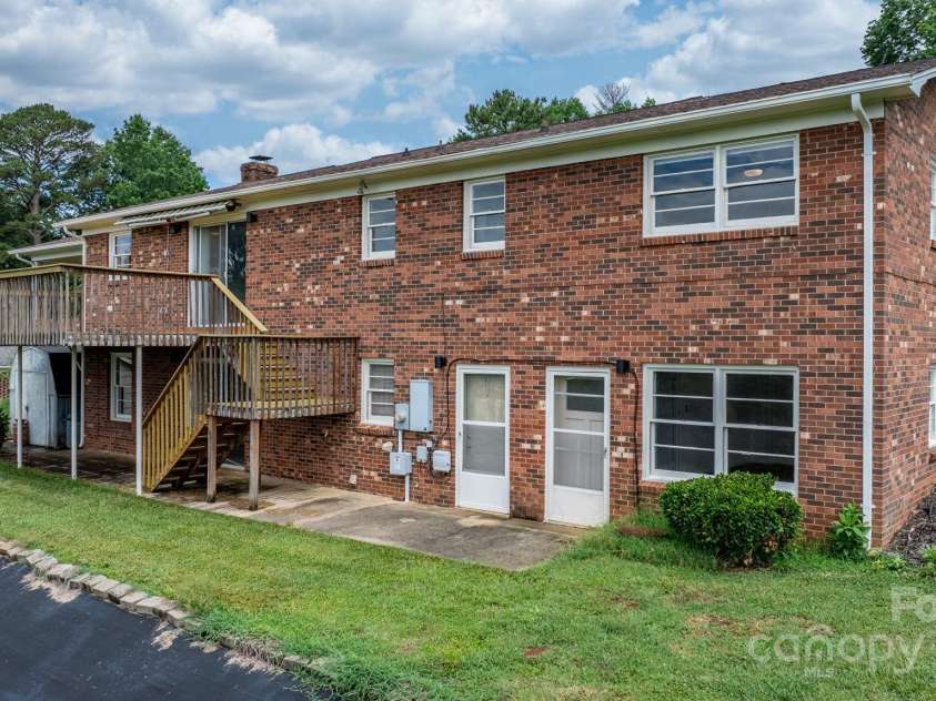 114 Joe Teague Road, Hickory, NC 28601.  MLS# CAR4276648, YatesRealty ID 15681. Back of Home with Shed Tucked Beside Deck