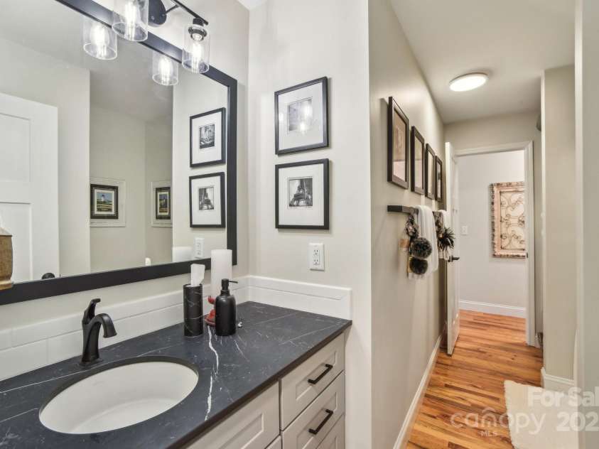 9 Circle Drive, Black Mountain, NC 28711.  MLS# CAR4260626, YatesRealty ID 15687. Bath with plenty of vanity space.