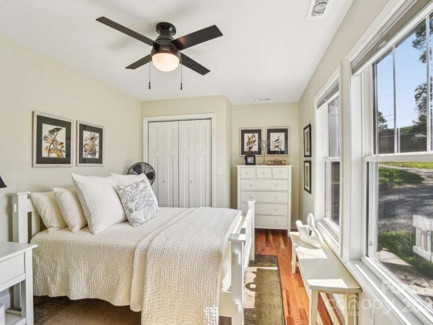 9 Circle Drive, Black Mountain, NC 28711.  MLS# CAR4260626, YatesRealty ID 15687. Front bedroom with loads of natural light.