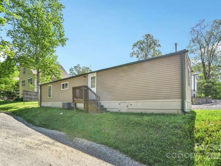9 Circle Drive, Black Mountain, NC 28711.  MLS# CAR4260626, YatesRealty ID 15687. It is also a totally rebuilt manufactured home.