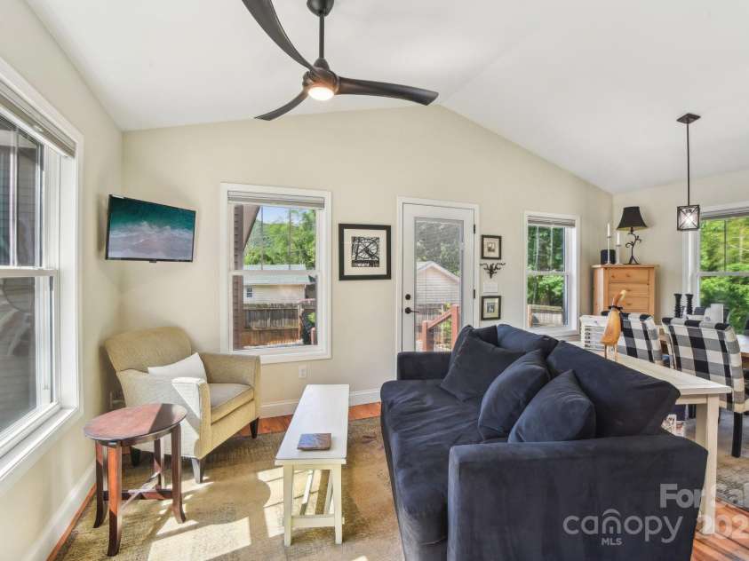 9 Circle Drive, Black Mountain, NC 28711.  MLS# CAR4260626, YatesRealty ID 15687. Living Room from the front door with vaulted ceilings.