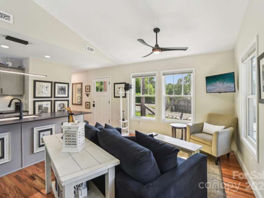 9 Circle Drive, Black Mountain, NC 28711.  MLS# CAR4260626, YatesRealty ID 15687. Living Room looking toward the front door.