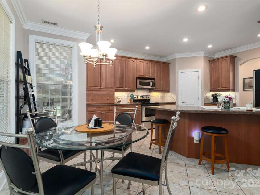 18118 Pompano Place, Cornelius, NC 28031.  MLS# CAR4263080, YatesRealty ID 15689. Breakfast Room, with Island and eating bar