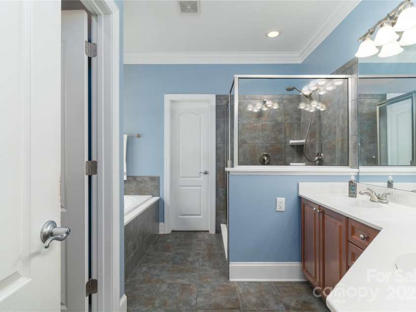 18118 Pompano Place, Cornelius, NC 28031.  MLS# CAR4263080, YatesRealty ID 15689. Primary Bathroom with dual sink vanity