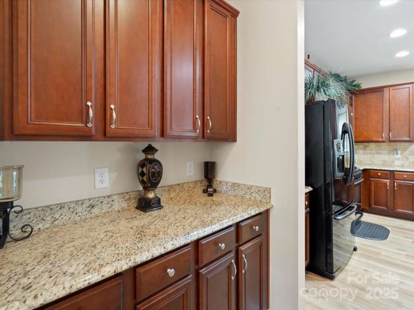 1051 Streamlet Way, Monroe, NC 28110.  MLS# CAR4259540, YatesRealty ID 15694. Loads of storage / butlers pantry. you could make this a coffee or wine bar!