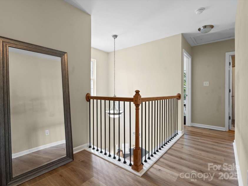 1051 Streamlet Way, Monroe, NC 28110.  MLS# CAR4259540, YatesRealty ID 15694. Upstairs hall with a view.