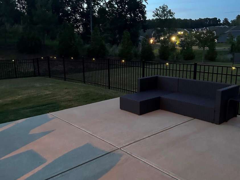 12417 Old Iron Lane, Charlotte, NC 28215.  MLS# CAR4289530, YatesRealty ID 15704. Back yard Fence Lights