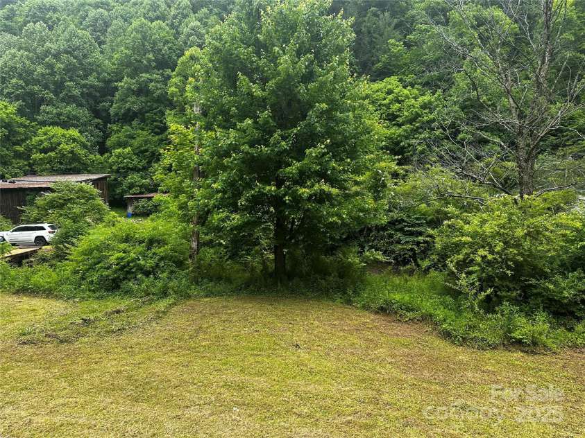 731 Pigeon Roost Road, Green Mountain, NC 28740.  MLS# CAR4264703, YatesRealty ID 15715. 