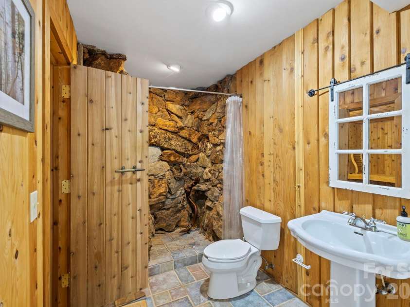652 Avery Creek Road, Arden, NC 28704.  MLS# CAR4282113, YatesRealty ID 15716. Bathroom with sauna lower level