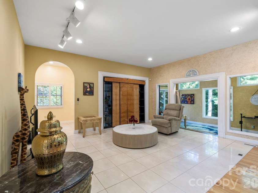 652 Avery Creek Road, Arden, NC 28704.  MLS# CAR4282113, YatesRealty ID 15716. Second main level living room