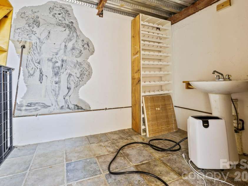 652 Avery Creek Road, Arden, NC 28704.  MLS# CAR4282113, YatesRealty ID 15716. Wine cellar/flex or bonus room