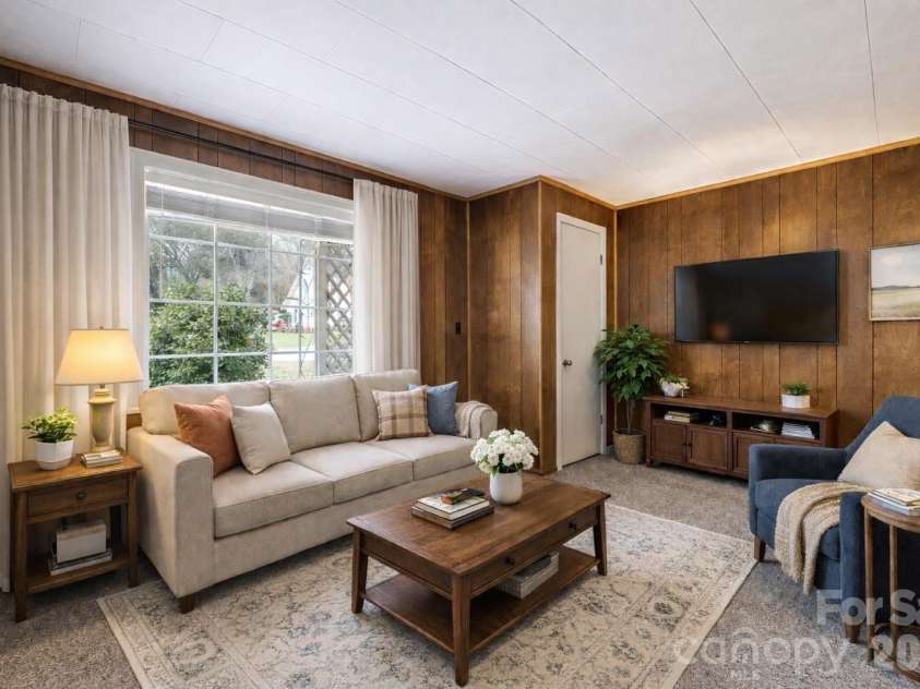 1124 Skyland Drive, Sylva, NC 28779.  MLS# CAR4342310, YatesRealty ID 15717. Sitting Room virtual staging
