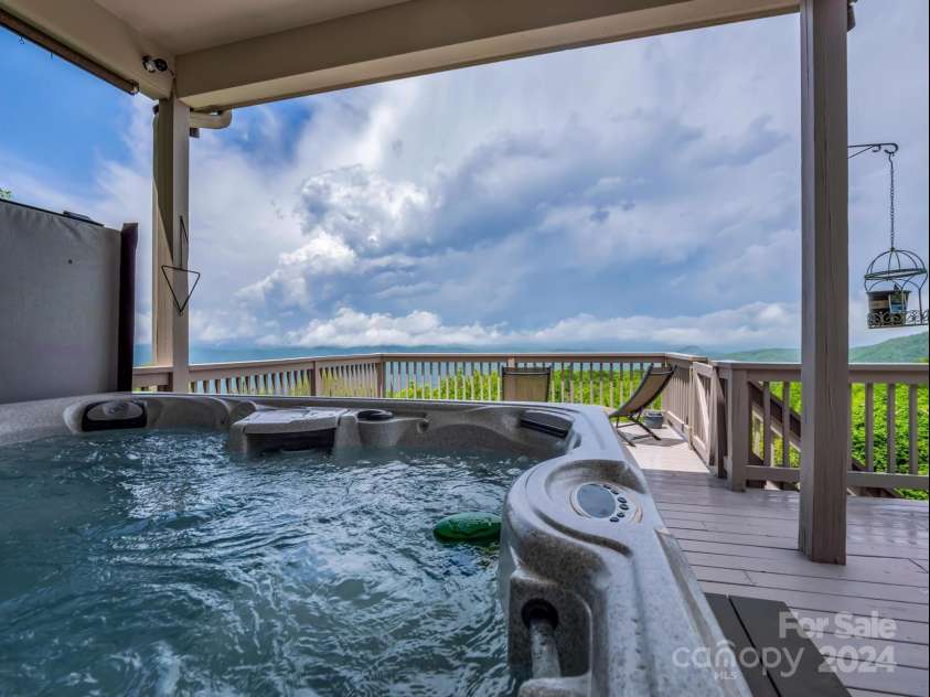 428 Devils Hole Road, Rosman, NC 28772.  MLS# CAR4138356, YatesRealty ID 1572. Long range view from hot tub