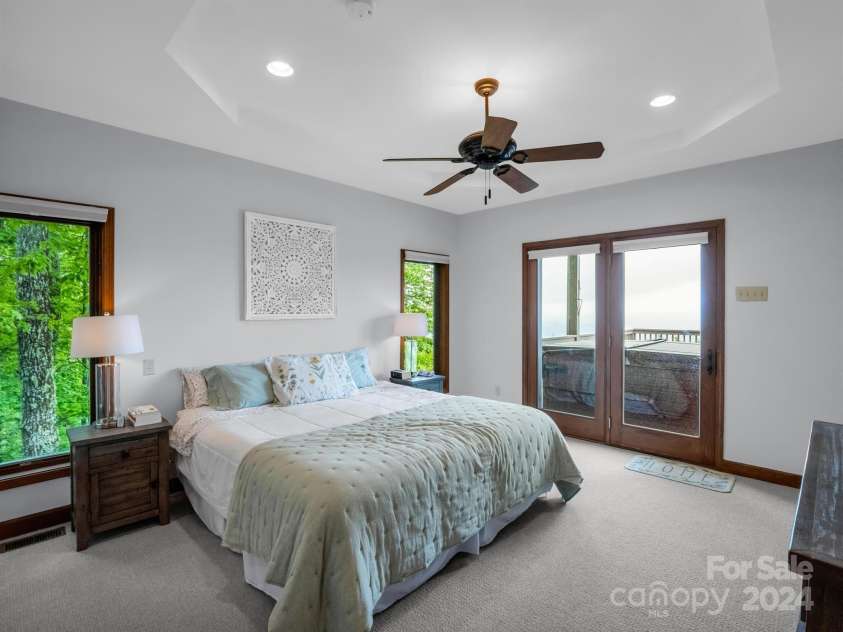 428 Devils Hole Road, Rosman, NC 28772.  MLS# CAR4138356, YatesRealty ID 1572. Primary bedroom - with deck access
